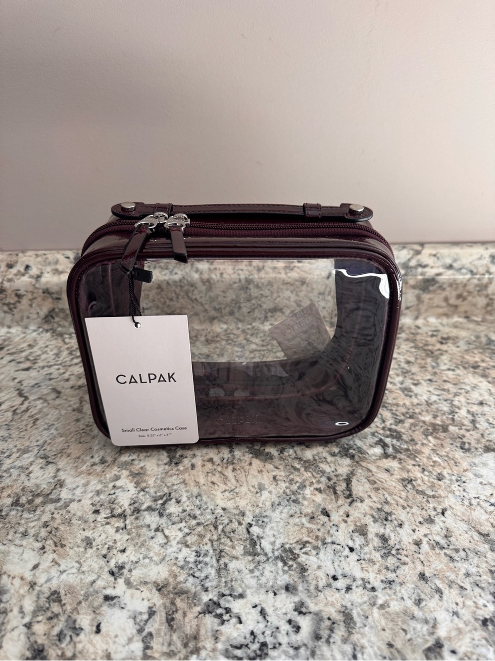Calpak Glazed Dark Cherry Clear Cosmetic Case, size small